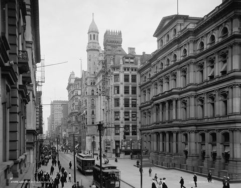 Chestnut Street in Philadelphia around 1900, with tall stone buildings and streetcars.